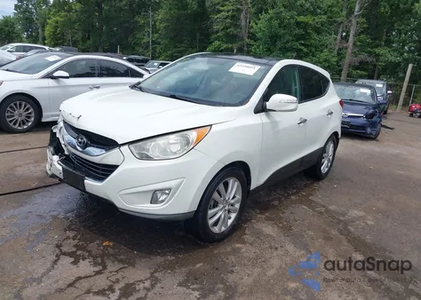 2010 Hyundai Tucson Limited z USA, uszkodzony, nr VIN KM8JUCAC5AU051857